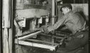 man-operating-a-brick-oven